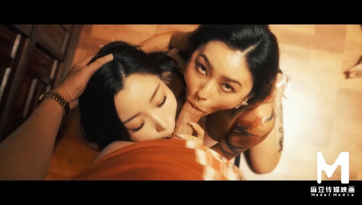 Two tattooed Asian beauties take turns riding one lucky guy hard